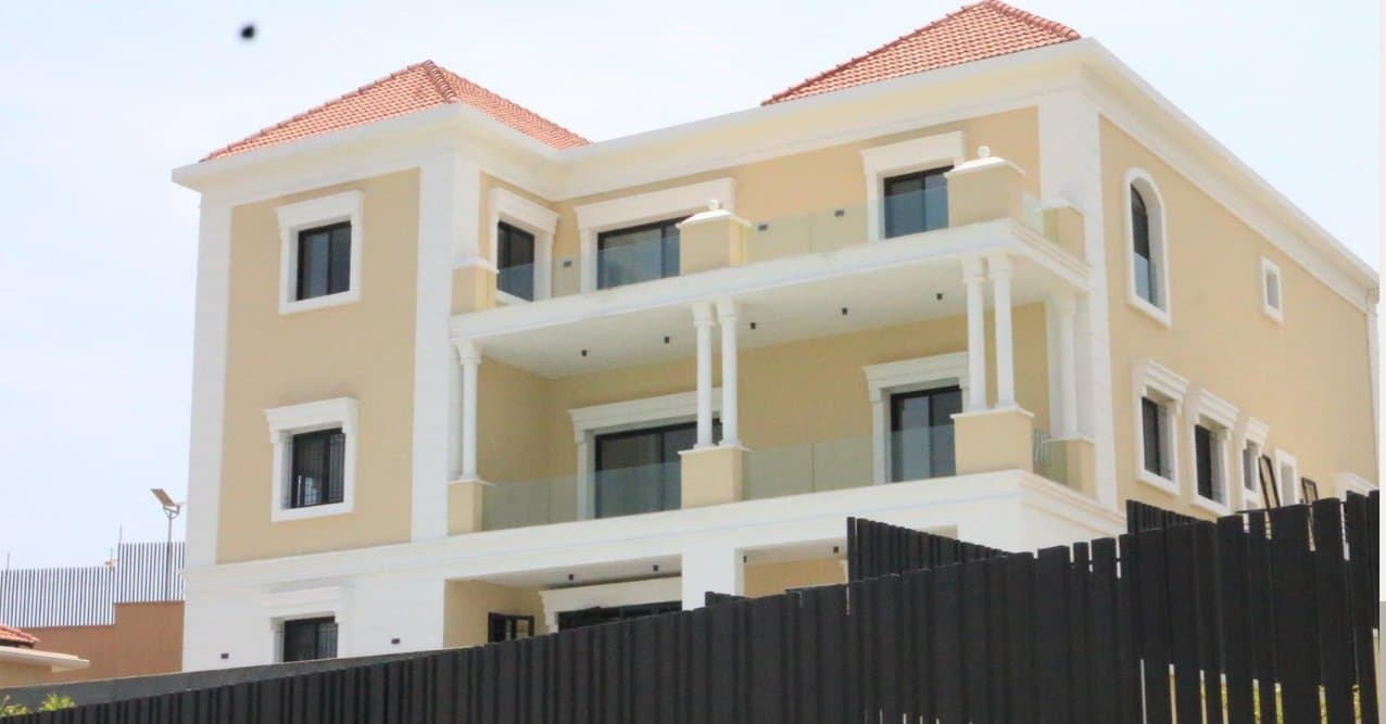 Cream villa with balconies