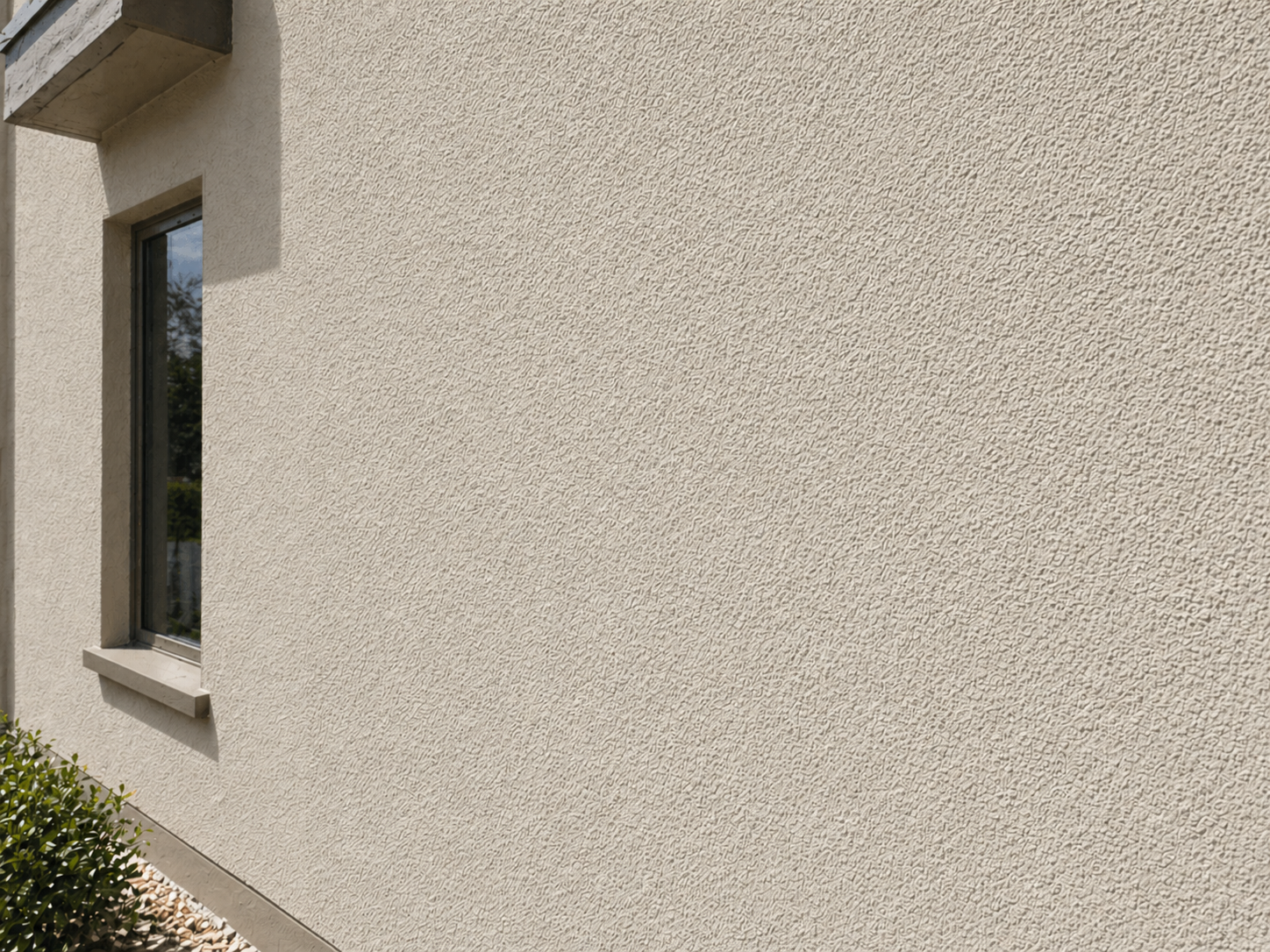 Textured exterior wall finished in Texcoat